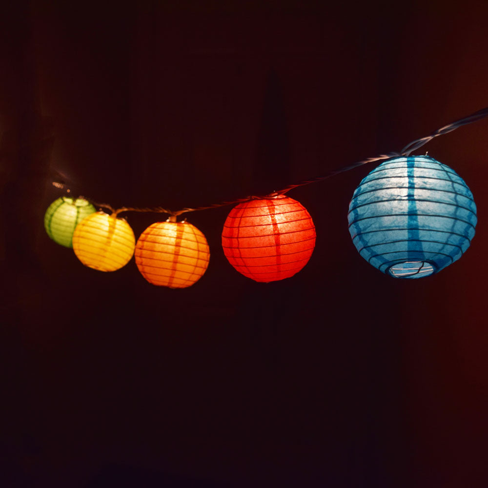 Premium Photo  Vintage of tissue paper lanterns hanging the floor at  night. paper lamps.